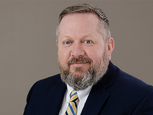 YATES RECEIVES PROMOTION AT FIRST COMMUNITY BANK