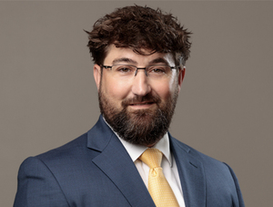FIRST COMMUNITY BANK PROMOTES BARNES