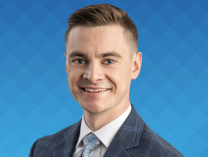 FIRST COMMUNITY BANK PROMOTES REESOR