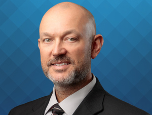 MCCOMAS EARNS PROMOTION AT COMMUNITY INSURANCE