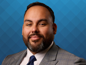 FIRST COMMUNITY BANK PROMOTES OLIVA